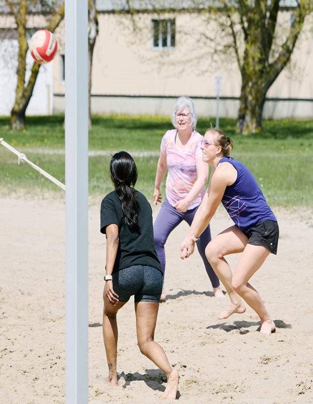 playing beach volleyball