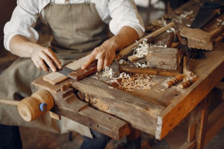 man wood working