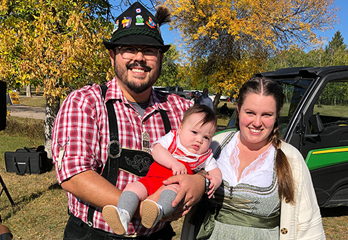 Family walking getting ready to walk the trail and dressed in fun German attire