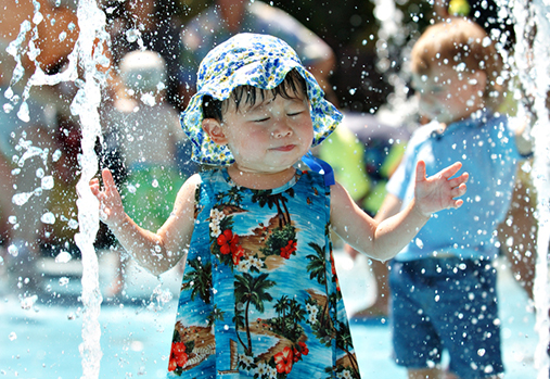 child in splash pad