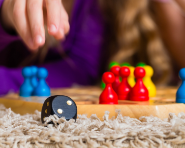 Close-up of a board game with colorful pieces.