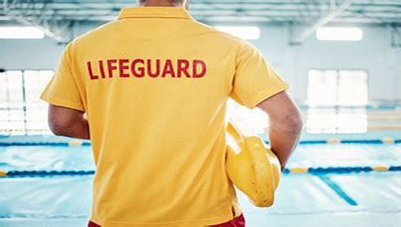 Lifeguard guarding pool