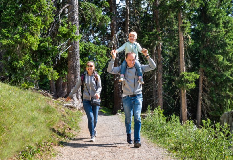 Family walking in an outdoor park