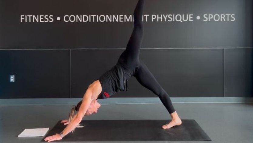 Fitness instructor performing mobility exercises