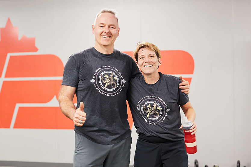 two CAF members smiling