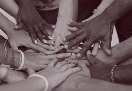 Diverse human hands showing unity