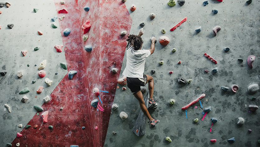 youth climbing rock wall