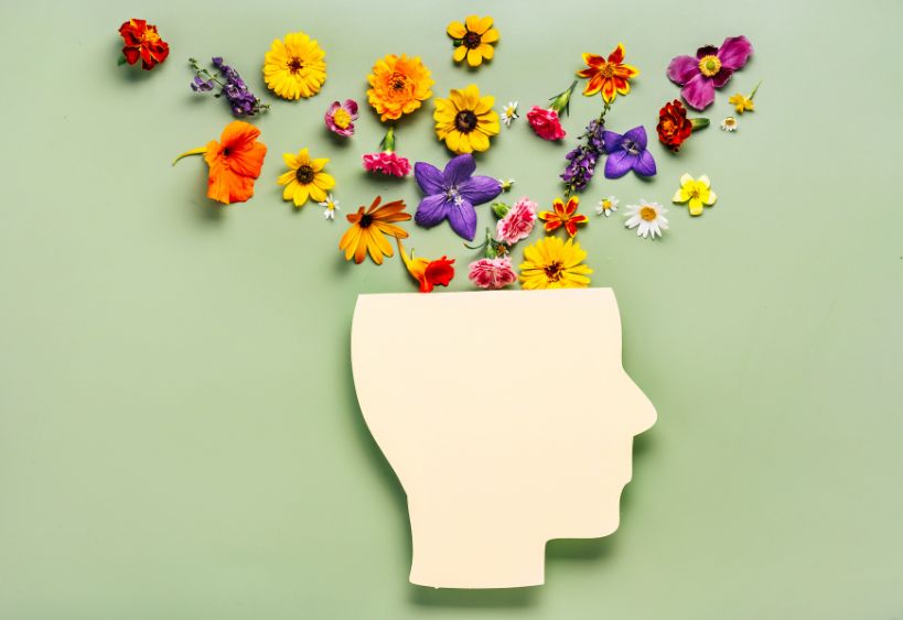 Flowers emerging from a head