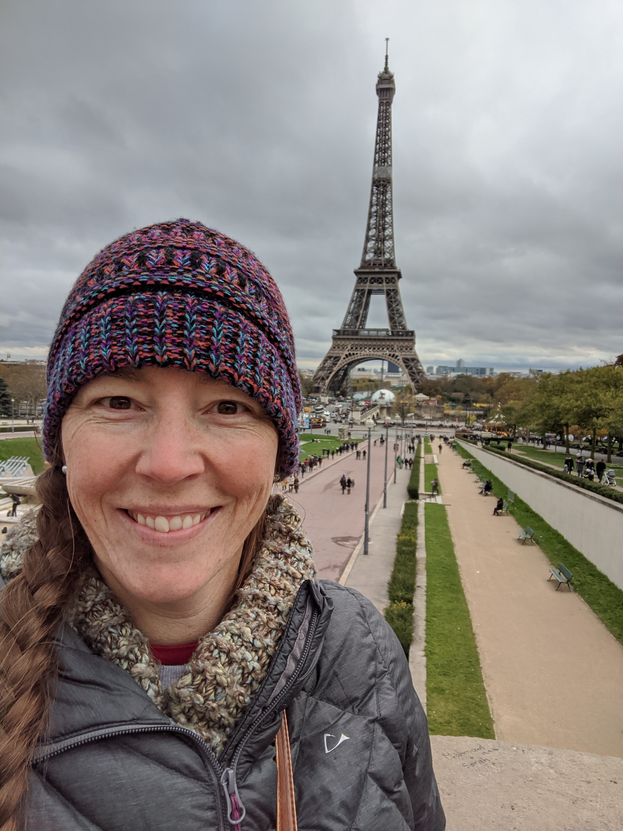 author Kristy Fallon in front of Eiffel Tower