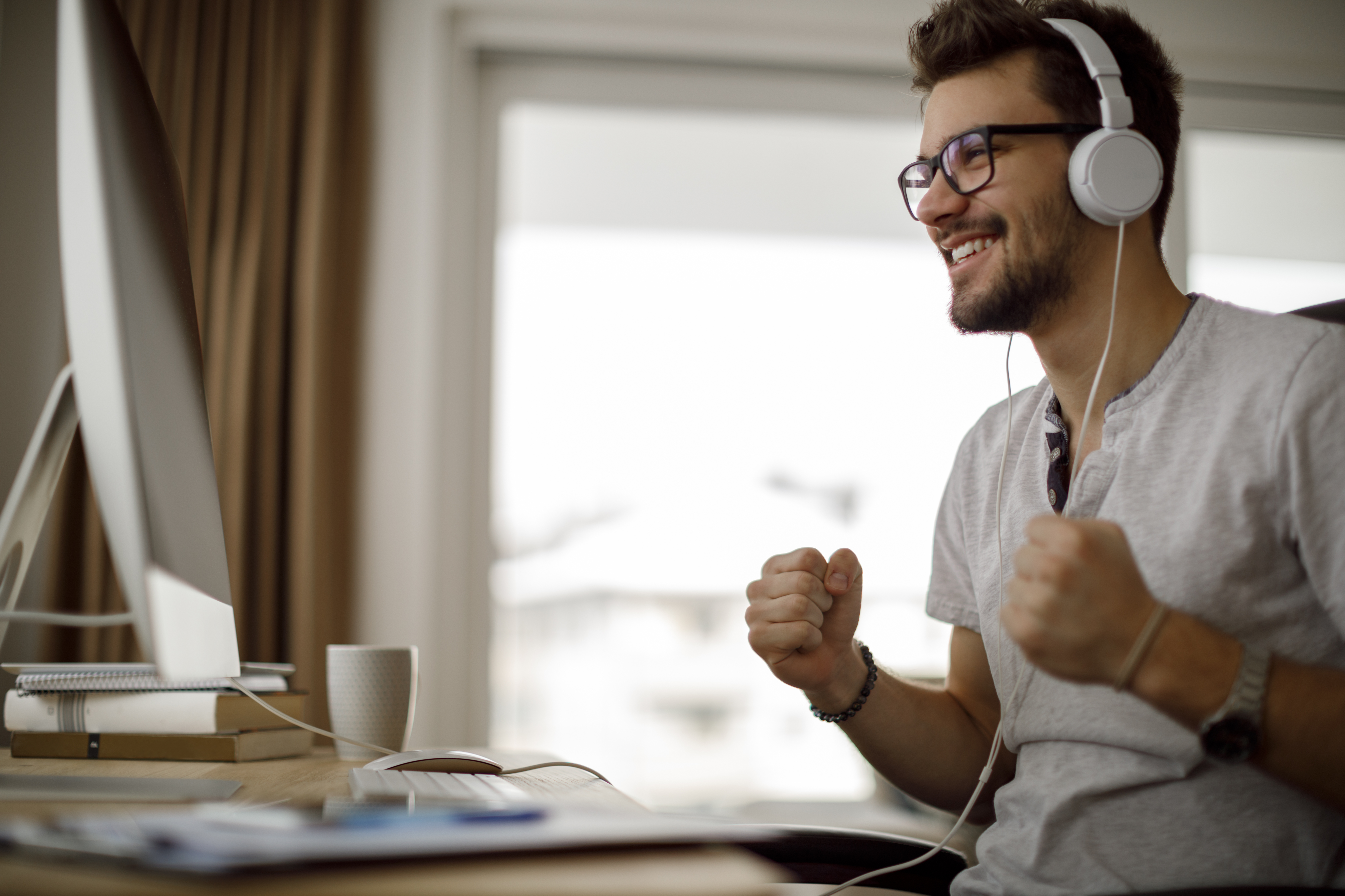 man looking at a computer