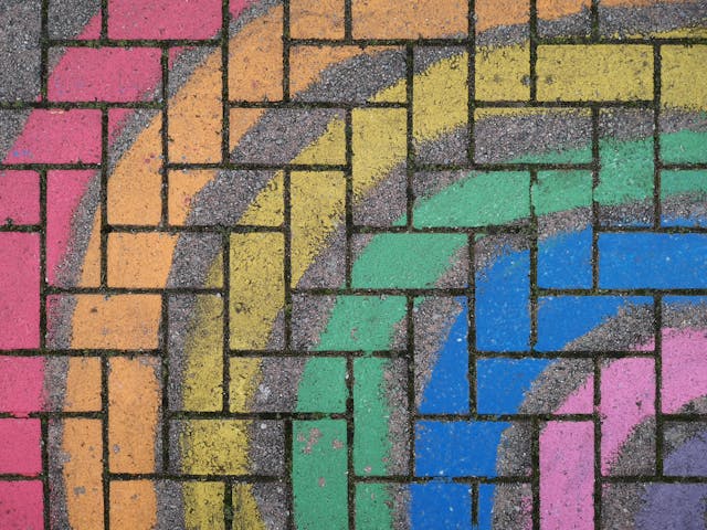 chalk rainbow on brick background
