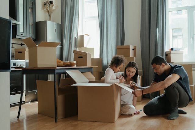 family colouring on the flap of a moving box