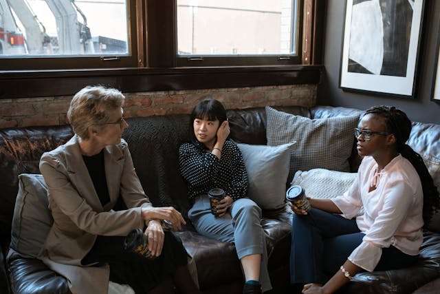 Three Women Talking Together