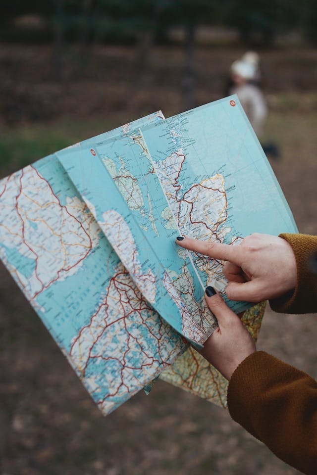 Woman Holding a Map