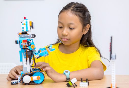 child using lego blocks