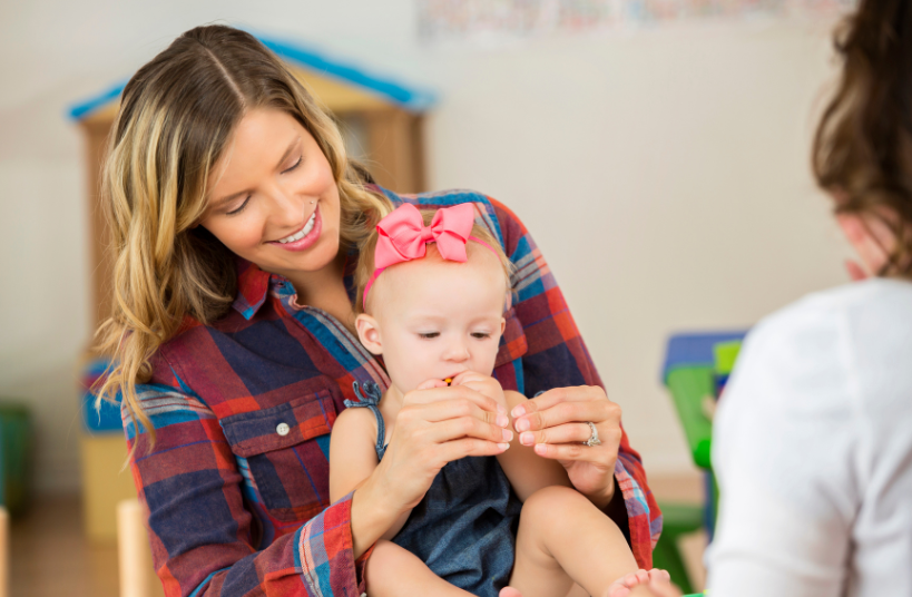 mother and child signing