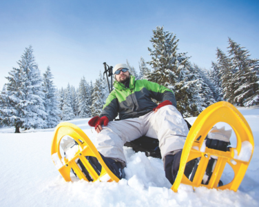 Man wearing snow shoes