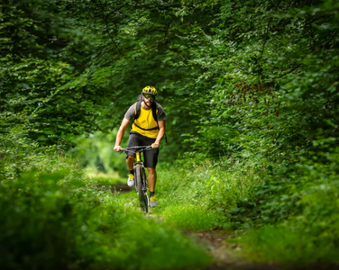 biking on a trail in a forest