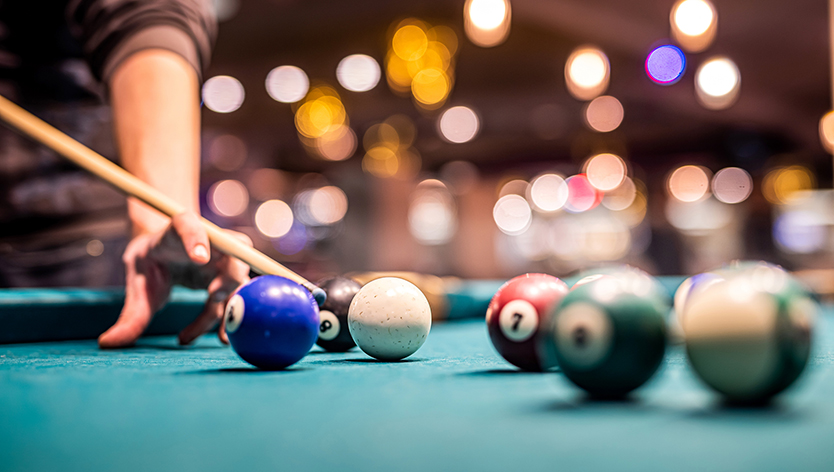 person playing pool