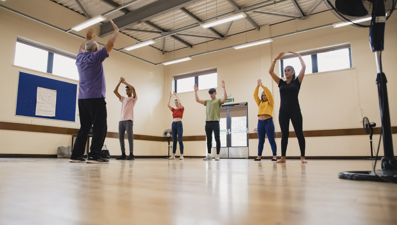 people stretching in a room