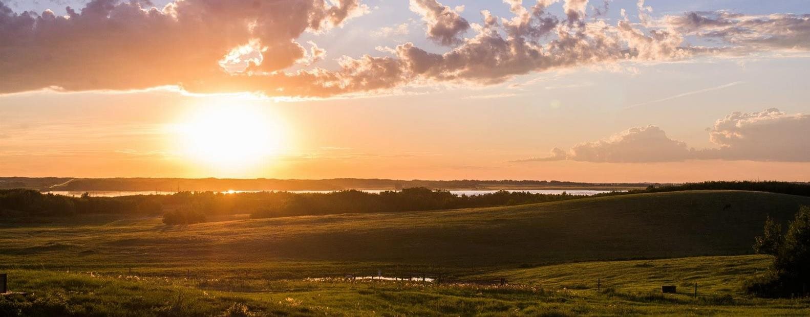 Sunset over hill top