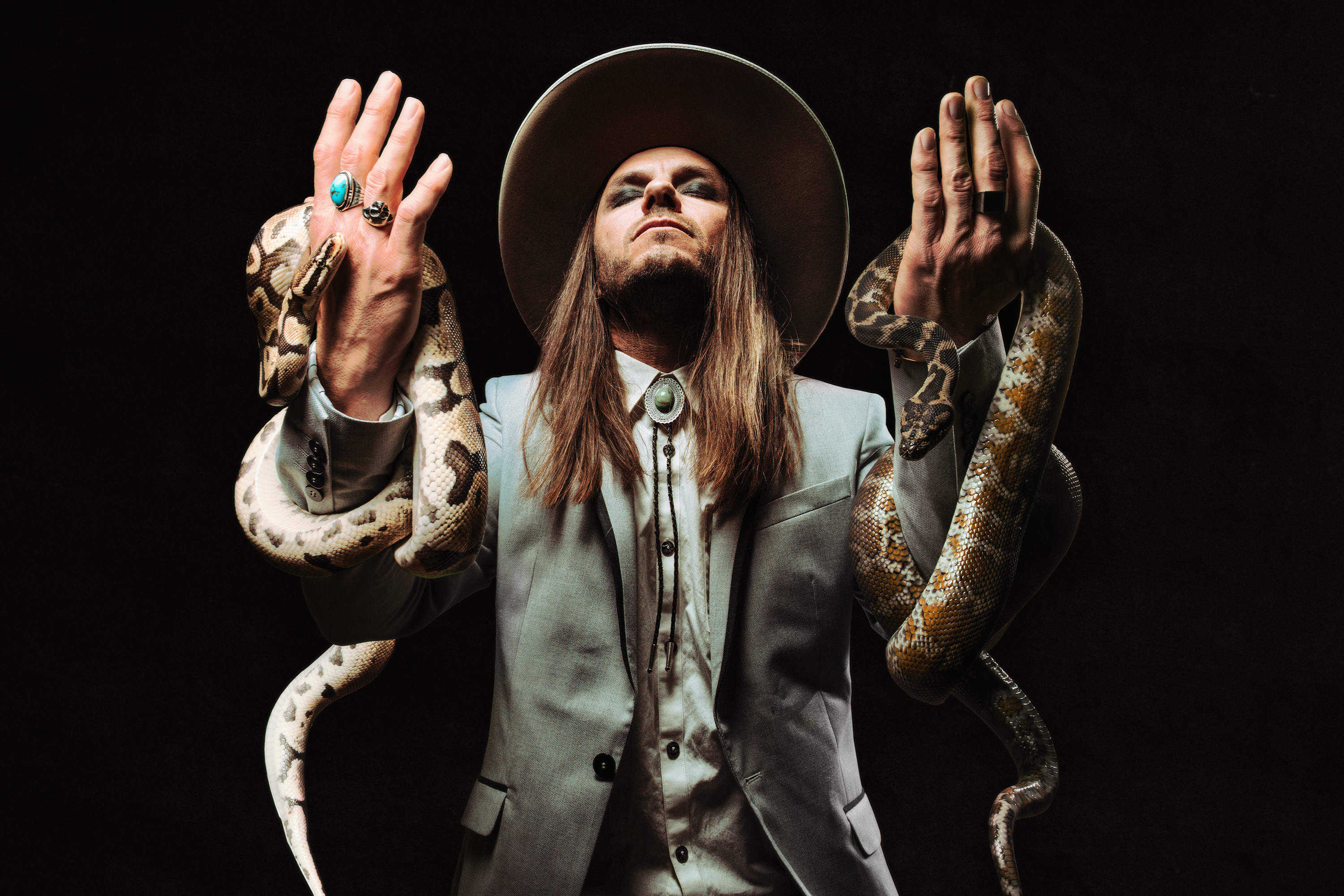 Clayton Bellamy holding a snake