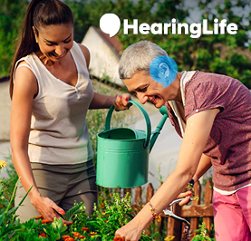 Two women gardening, HearingLife logo