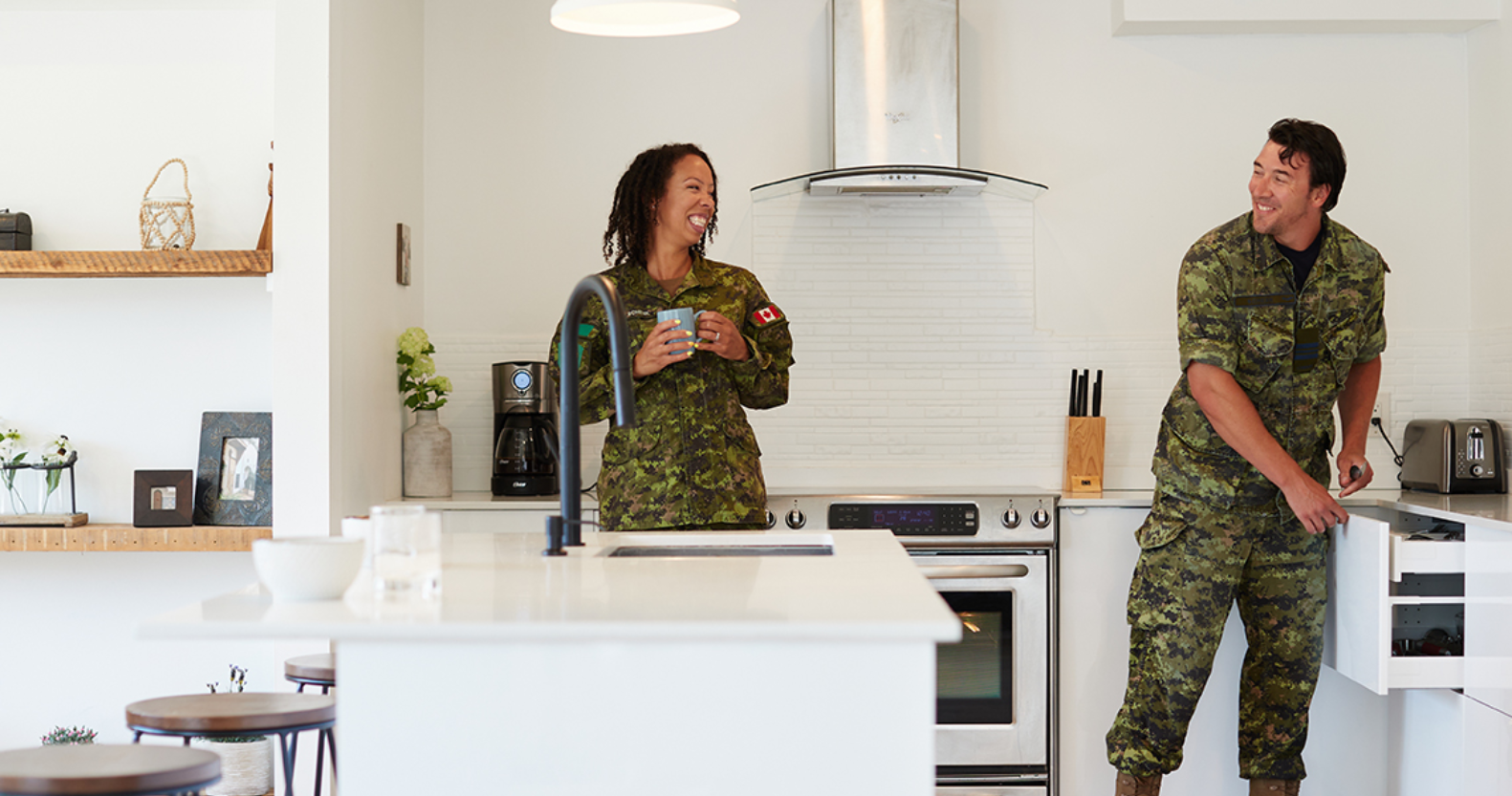 A military couple in their kitchen