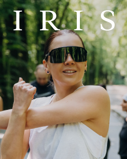 Woman wearing sunglasses, IRIS logo