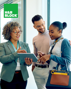 couple working with advisor on taxes, H&R block logo