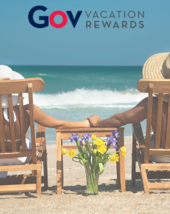 People sitting on beach chairs at ocean, GVR logo