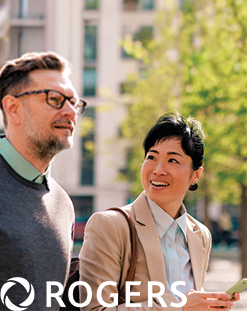 people talking with cell phone in hand, Rogers logo