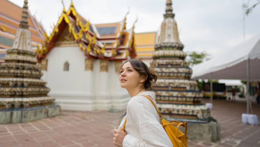 Woman in front of temple