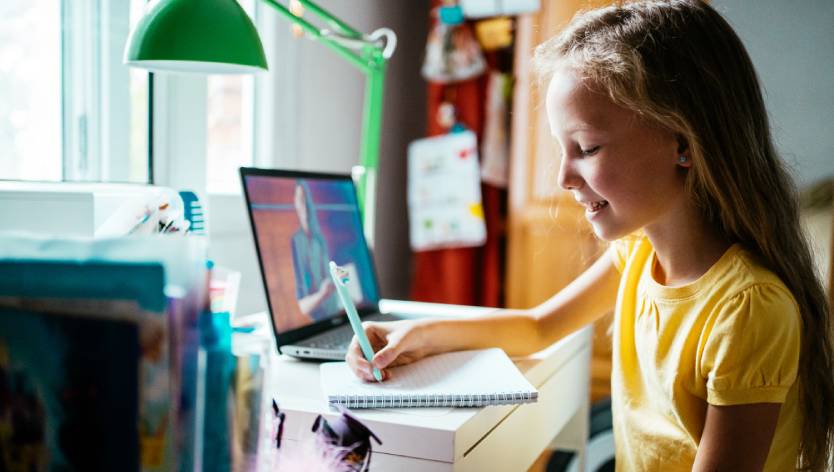 Young girl using laptop