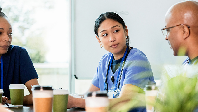 Hospital employees discussing policies