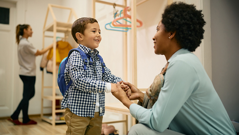 Mother greeting son after school