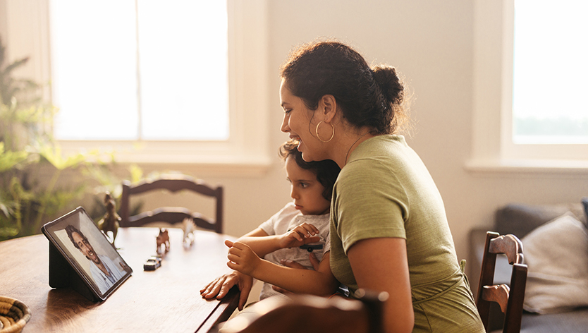 Mother and child speaking to a doctor on call