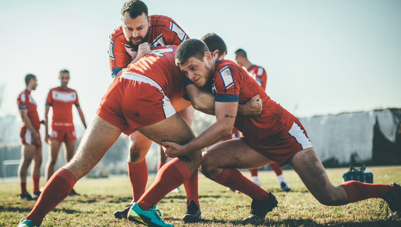 men playing rugby