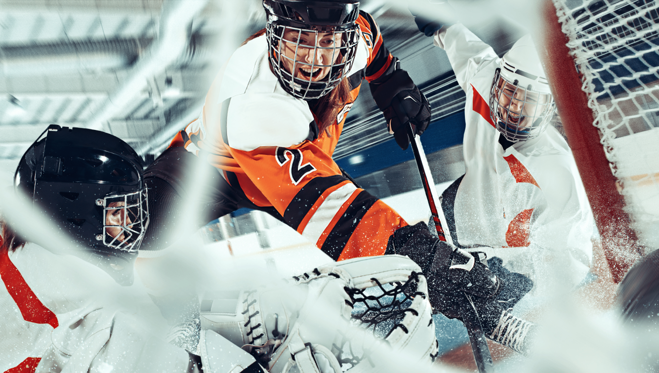 women playing hockey