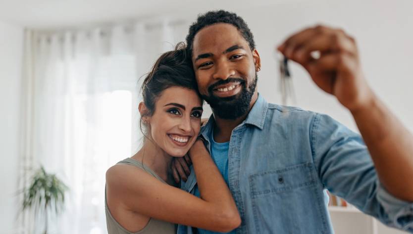 man and woman with keys