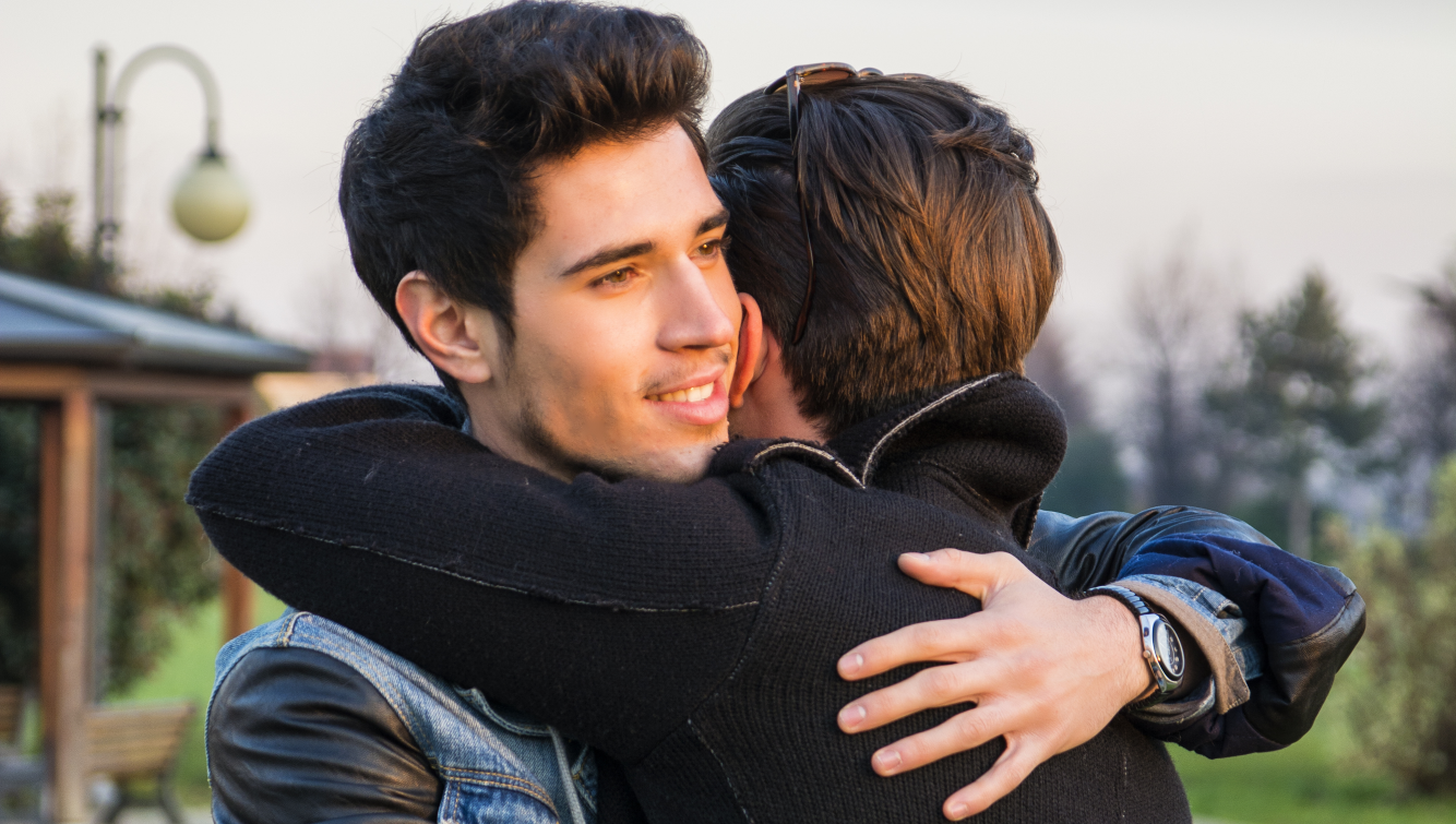 2 men hugging