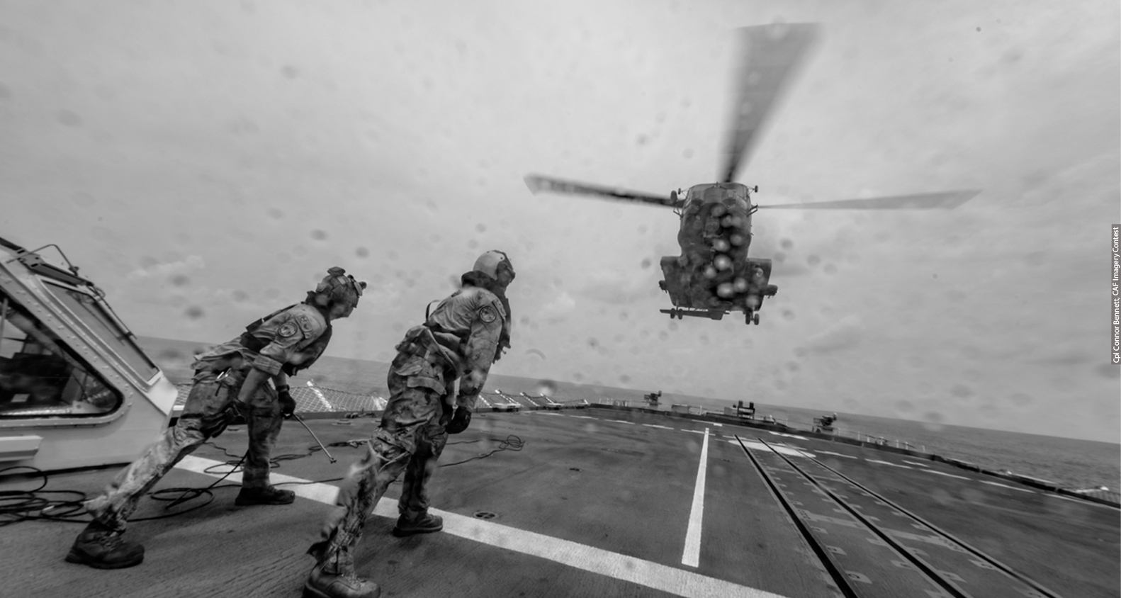 Soldiers rowing a raft