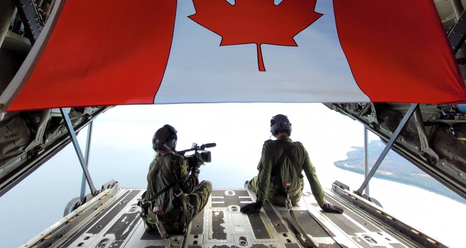 Soldiers with a Canadian flag