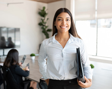 A women holding a binder