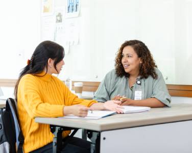 social worker talking to teen