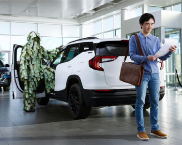 A man at a car dealership