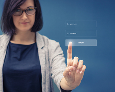 woman clicking login button