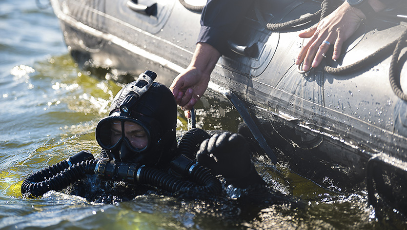 clearance diver in water