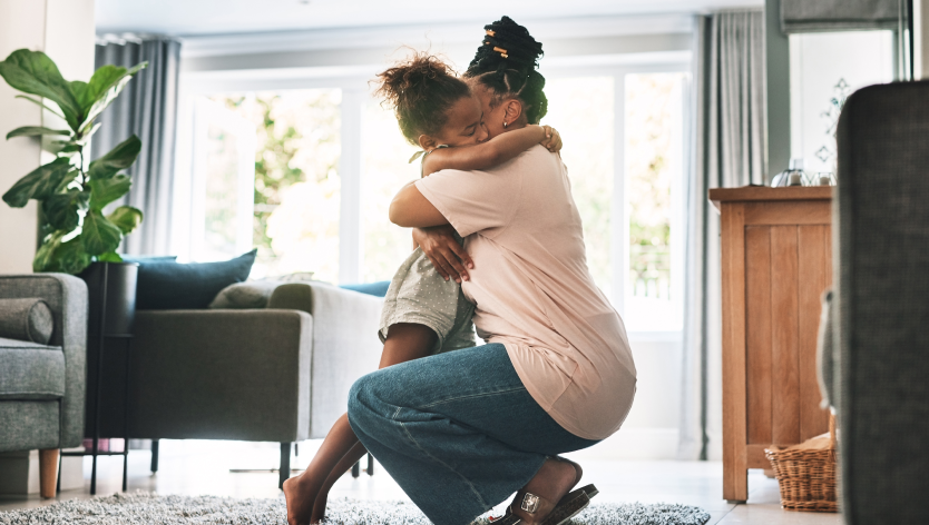 Child hugging mother 