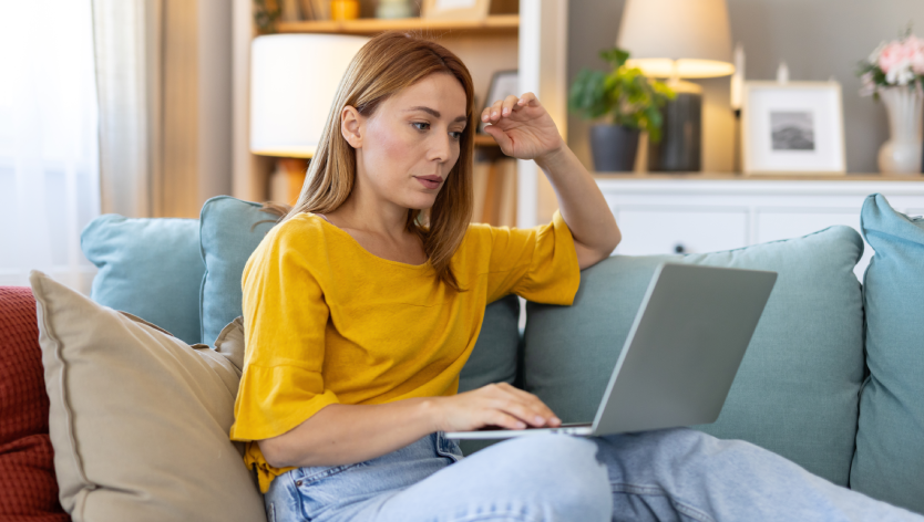 a woman in front of a computer
